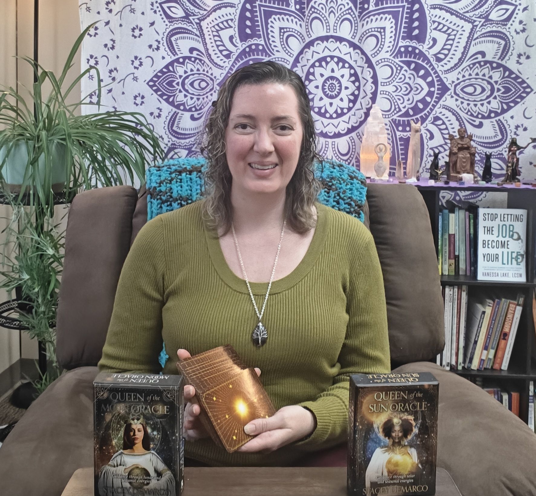 vanessa shuffling oracle cards in her office