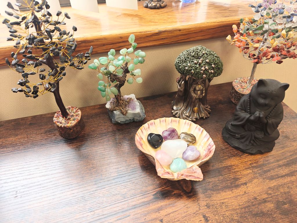 shell full of crystals black meditating cat and crystal trees