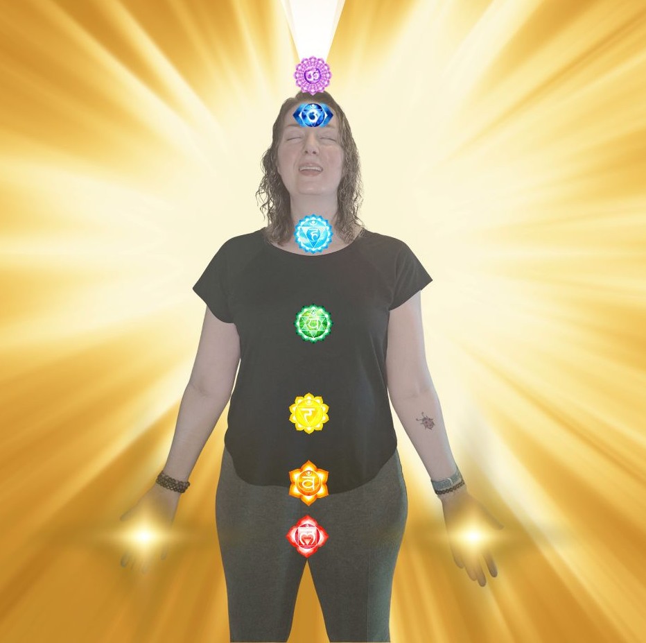 vanessa standing with chakra symbols on body